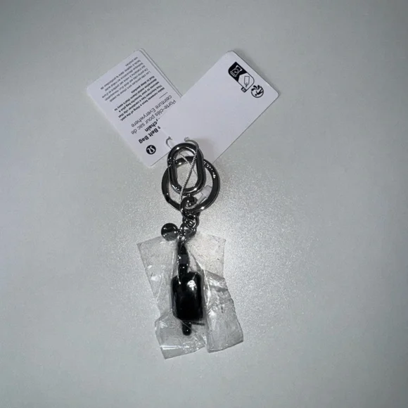 Lululemon Everywhere Belt Bag Charm Keychain in Black/Silver - Picture 1 of 3
